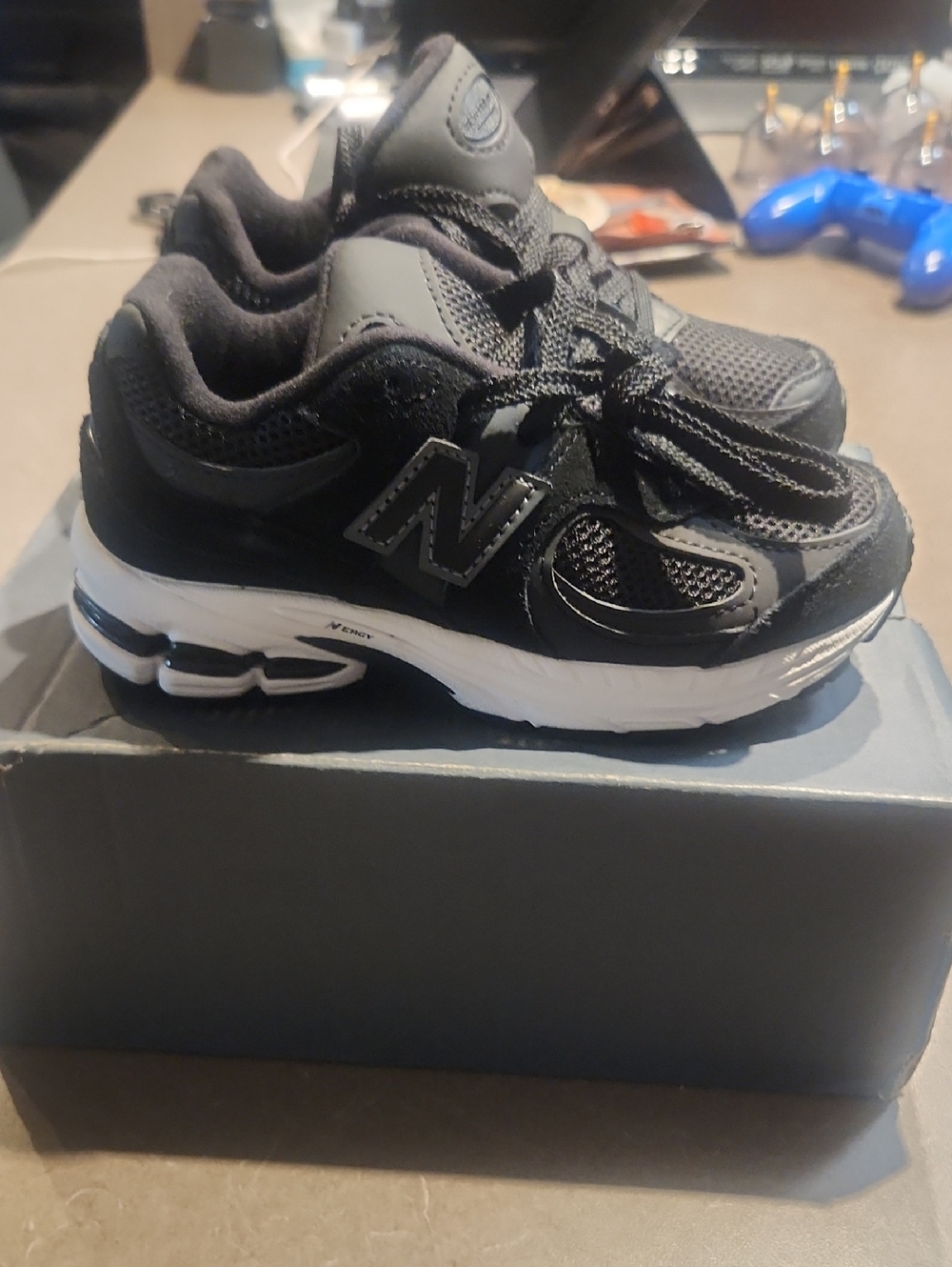 New Balance Kids Black and White Running Sneakers